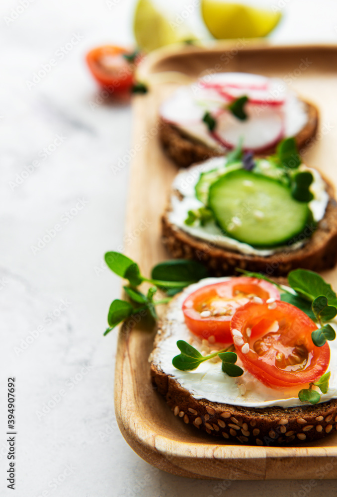 Sandwiches with healthy vegetables and micro greens Sandwiches with healthy vegetables and micro greens