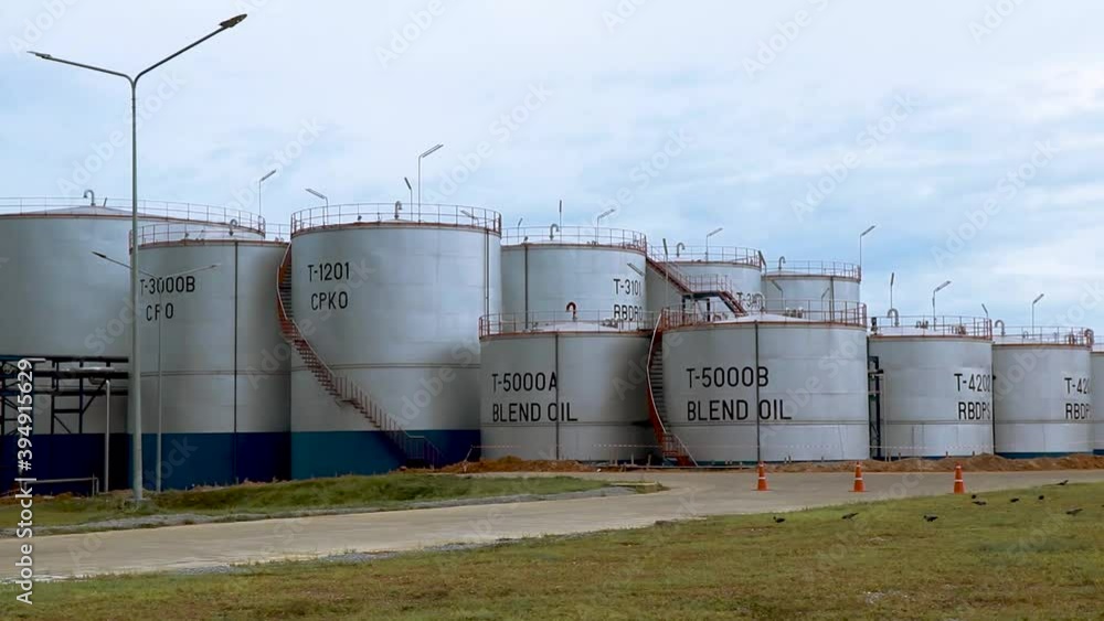 Large palm oil storage tanks in the palm industrial complex. Large palm oil storage tanks in the palm industrial complex.