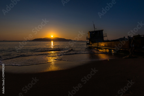 Sunrise on Nha Trang beach in Vietnam © sitriel