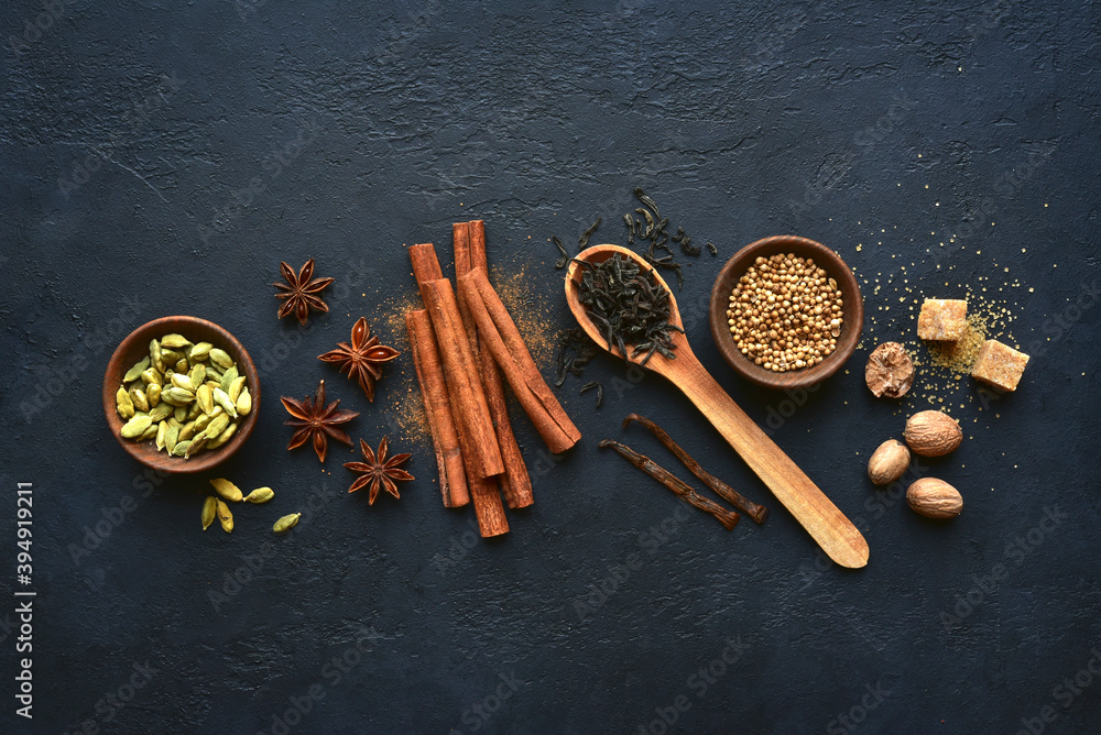 Ingredients for making traditional indian tea masala. Top view with copy space. Ingredients for making traditional indian tea masala. Top view with copy space.