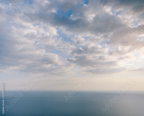 Calm sea and cloudy sky. © Alex Photo