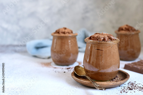 Delicious chocolate mousse in a vintage jars. photo