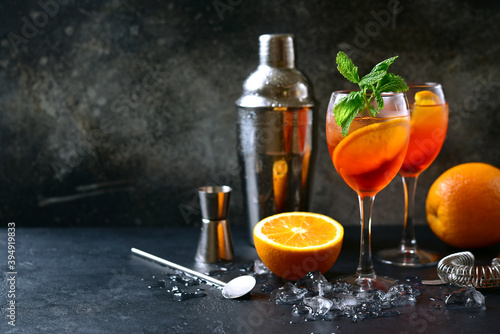 Delicious italian cocktail aperol spritz with orange. photo