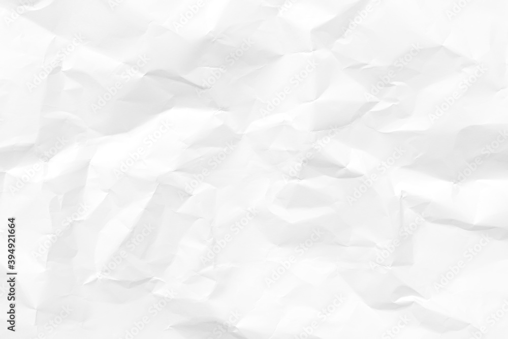 White crumpled paper texture background. Clean white paper. Top view. White crumpled paper texture background. Clean white paper. Top view.