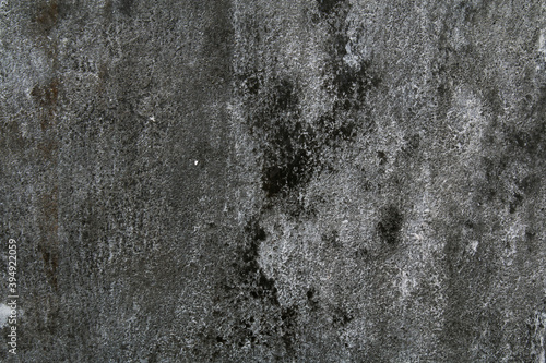 Gray concrete wall peeled wallpaper. Concrete background.