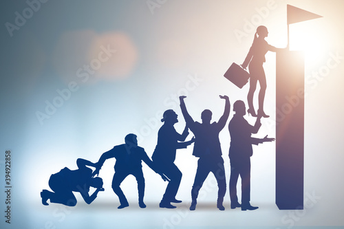 Career progression concept with businessman climbing stairs