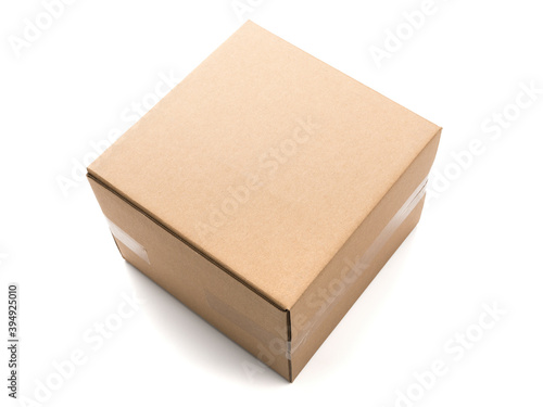 Corrugated cardboard parcel isolated on white © eyewave