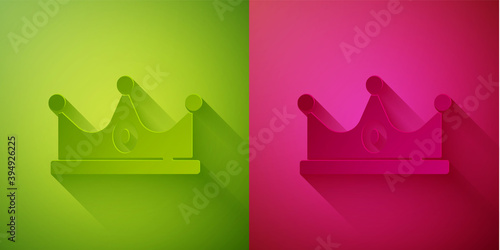 Paper cut King crown icon isolated on green and pink background. Paper art style. Vector.