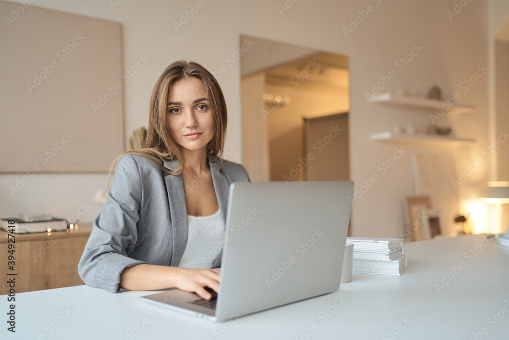 Beauitul young woman working using computer laptop concentrated. High quality photo Beauitul young woman working using computer laptop concentrated. High quality photo