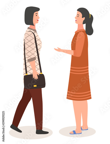 Speaking woman flat illustration. Two women met and stand talking. Girlfriends saw each other and discuss events, tell about what happened. Happy smiling female characters has a conversation