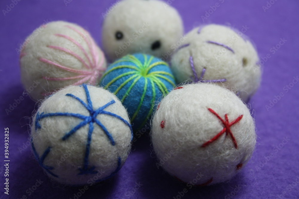Woolen beads on a violet background. Woolen beads on a violet background.