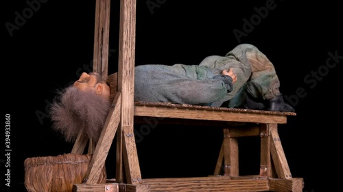 The guillotine cuts off the head of the criminal. Previously, such an execution was considered humane. The video shows a mockup that shows how the device works