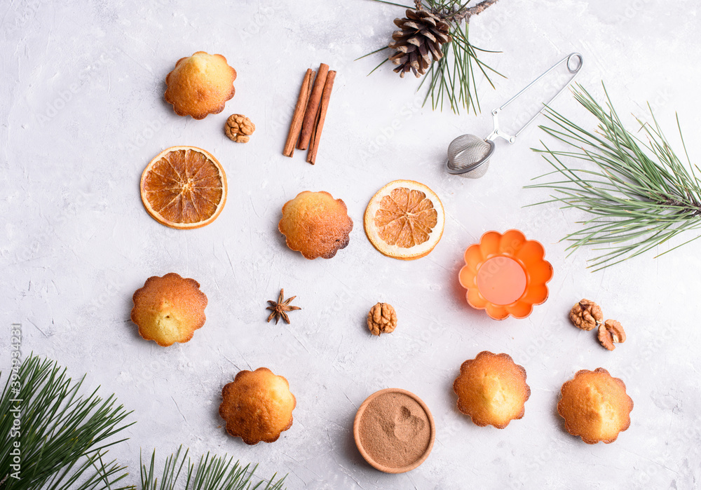 Delicious fragrant vanilla cupcakes on a light background. A place for text, a view from above. Recipes. Delicious fragrant vanilla cupcakes on a light background. A place for text, a view from above. Recipes.