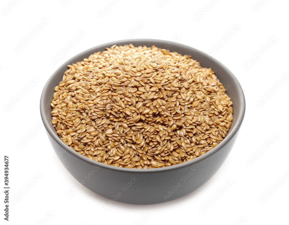 Golden linseed, linen seeds in porcelain bowl isolated on white background Golden linseed, linen seeds in porcelain bowl isolated on white background