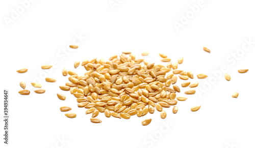 Golden linseed, linen seeds pile isolated on white background
