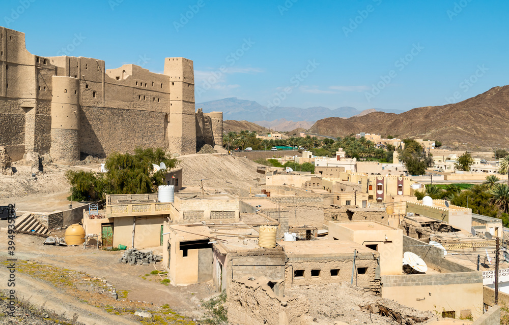 View of Bahla Fort and old town at the foot of the Djebel Akhdar in Sultanate of Oman. Unesco World Heritage Site.