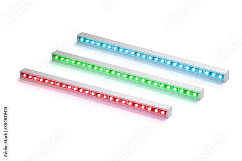 Set of green red and blue aluminum LED flood light bars for energy saving idustrial or decorative lightning isolated on white background photo