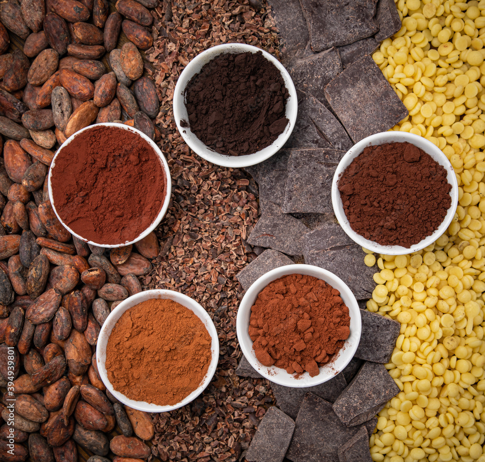 All kinds of cocoa. Beans, grated, pressed and cocoa butter on a wooden table
All kinds of cocoa. Beans, grated, pressed and cocoa butter on a wooden table