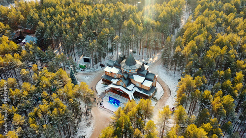 The residence of Russian Santa Claus is surrounded by forest. The view from the height of bird flight. photo