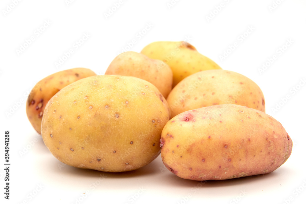 Young potato isolated on white background. Harvest new. Flat lay Young potato isolated on white background. Harvest new. Flat lay