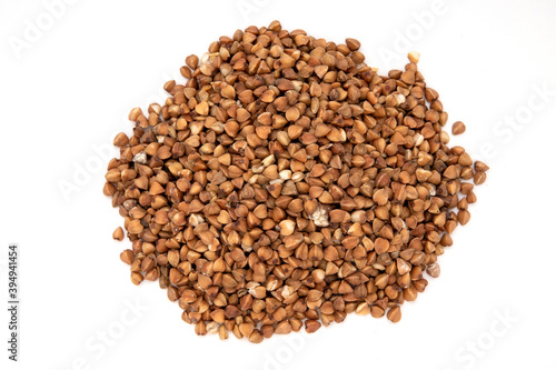 Pile of buckwheat isolated on white background.