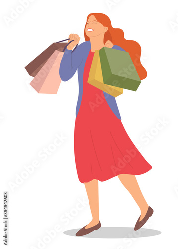 Woman with shopping bags is smiling happily. Young beautiful happy girl picks up multi-colored packages. Sale advertising concept. Female character with packages in her hands on white background