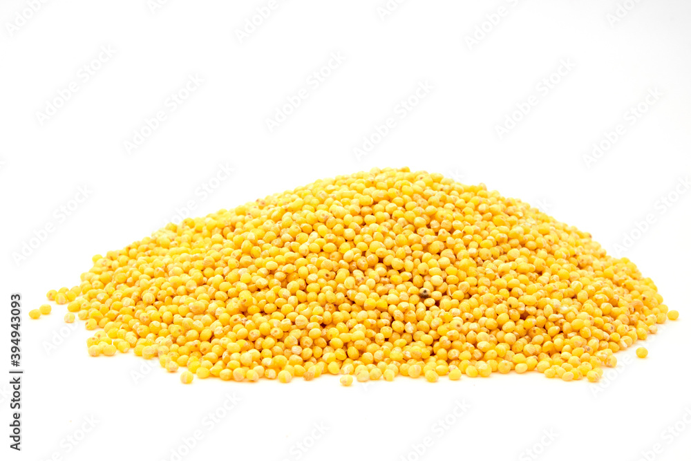 Heap of millet groats on white background Heap of millet groats on white background