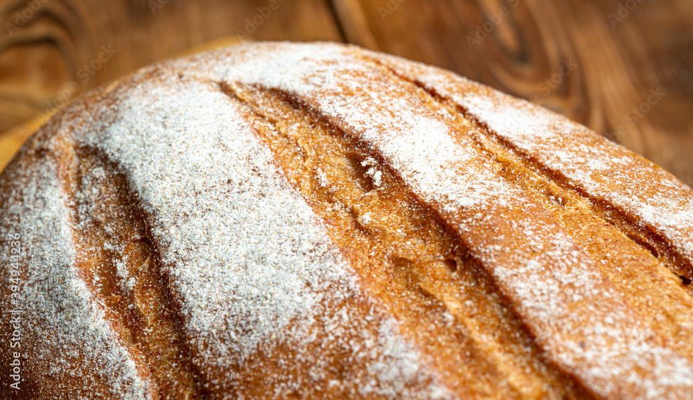 wheat bread on a wooden table