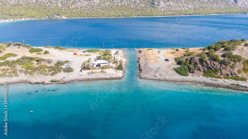 Peloponnese, Greece Aerial view on turqouise blue water and sandy beach. Limni Vouliagmeni or Ireon Lake, 