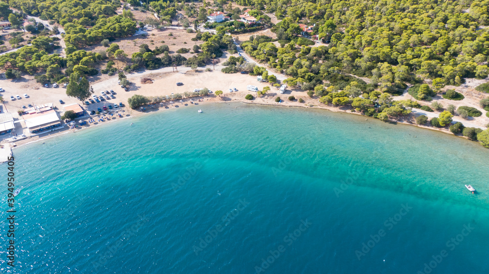 Peloponnese, Greece Aerial view on turqouise blue water and sandy beach. Limni Vouliagmeni or Ireon Lake, Peloponnese, Greece Aerial view on turqouise blue water and sandy beach. Limni Vouliagmeni or Ireon Lake,