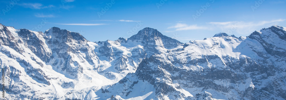 Shilthorn, alps panorama view and beautiful white winter wonderland scenery in the Alps