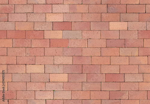 Seamless texture of street tiles. Pattern of terracotta paving slabs.