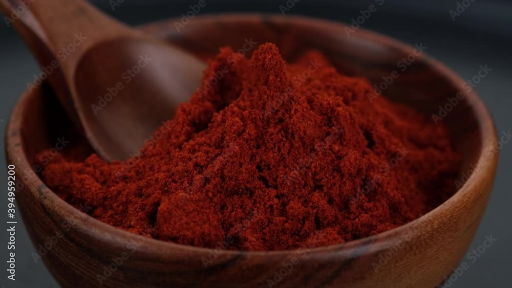 seasoning sweet smoked paprika in wooden bowl seasoning sweet smoked paprika in wooden bowl
