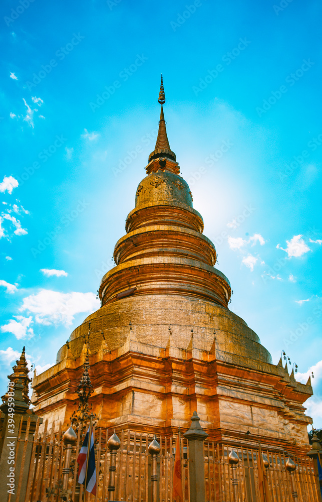 Naklejka premium Wat Phrathat Haripunchai Woramahawihan during Loy Khratong lantern festival in Lamphun, Chiang Mai, Thailand