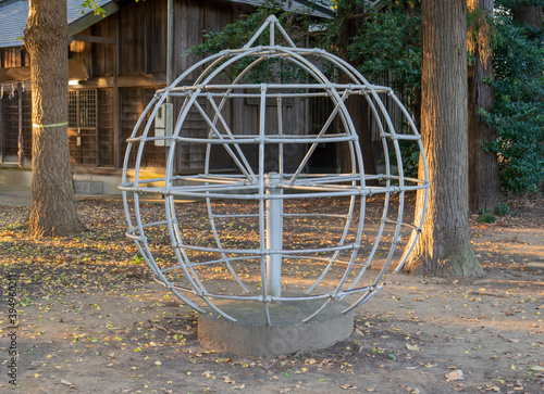 Obraz na plátne Playground equipment: old and rusty globe jungle gym in a rural park, Japan
