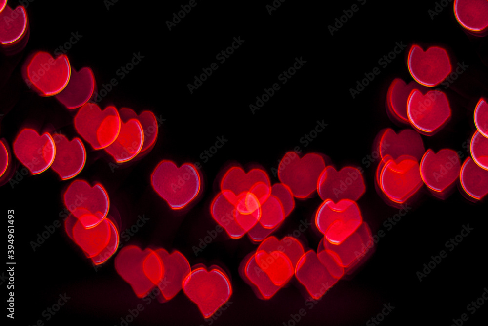 Red Heart Bokeh on black background. Valentine concept