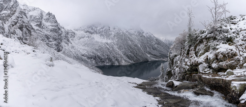 Fototapeta Naklejka Na Ścianę i Meble -  Snow-covered winter mountain lake at Eye of the Sea or Morskie Oko, Poland tatras mountain