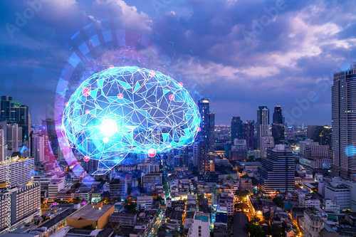 Human brain hologram, aerial panoramic city view of Bangkok at night. Educational cluster in Asia. The concept of artificial intelligence. Double exposure.