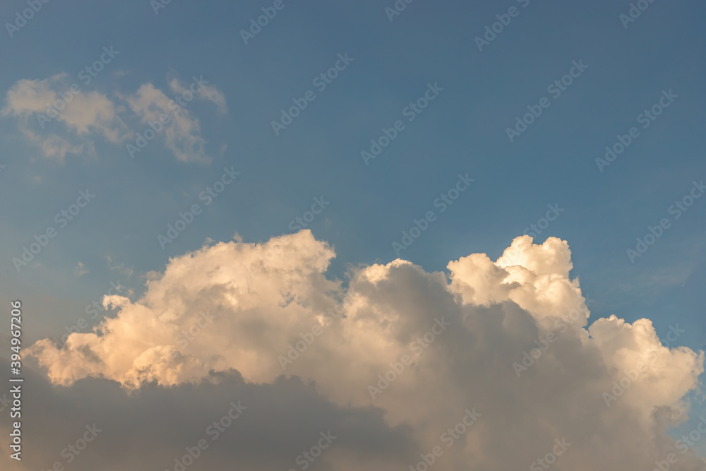 The cloudy beautiful sky with the light shining from the sun. The softness of the cloud creates a feeling of relaxation. copy space.