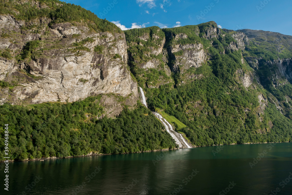 
mountainous landscape in norwegian fjords, great natural waterfall, nice norwegian nature
