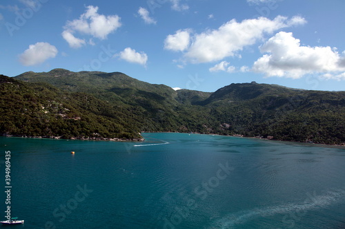 The beauty of the port of Labadee in Haiti s iland  clear vision  with high mountains  with tropical forest present trees and special animals.Dense and evergreen vegetation.