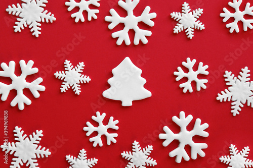 Wallpaper Mural White carved christmas tree and snowflakes of mastic on red background. Torontodigital.ca