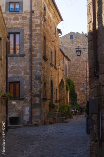 Fototapeta Naklejka Na Ścianę i Meble -  Civita di Bagnoregio is one of the most beautiful and characteristic Italian villages with corner of a quaint hill town, tiny alleys with the typical low-rise houses,typical of Medieval architecture.