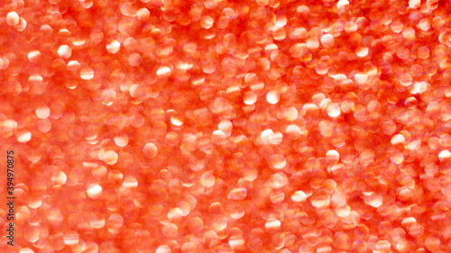 Christmas bokeh effect. Abstract texture of red.
