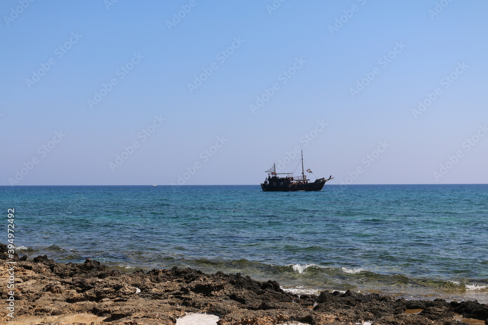 black ship on the Mediterranean sea Cyprus black ship on the Mediterranean sea Cyprus