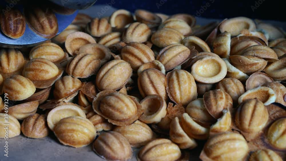 Baking in oven .Sweet pastries in the form of nuts Baking in oven .Sweet pastries in the form of nuts