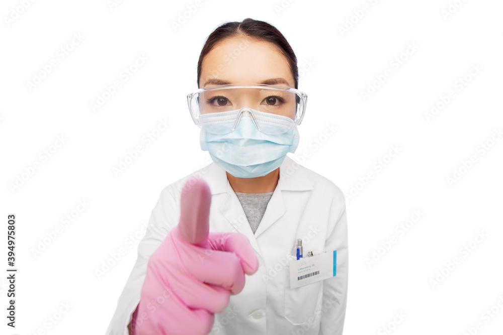 medicine, profession and healthcare concept - asian female doctor or scientist wearing face protective medical mask, gloves and goggles pointing to you over white background medicine, profession and healthcare concept - asian female doctor or scientist wearing face protective medical mask, gloves and goggles pointing to you over white background