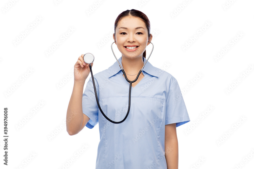 medicine, profession and healthcare concept - happy smiling asian female doctor or nurse with stethoscope over white background medicine, profession and healthcare concept - happy smiling asian female doctor or nurse with stethoscope over white background