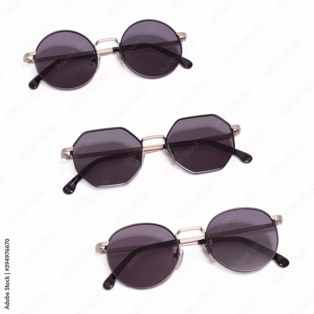 Fashion sunglasses with modern design on white background Fashion sunglasses with modern design on white background