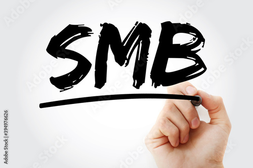 SMB - Small and Medium-Sized Business text with marker, acronym business concept background photo